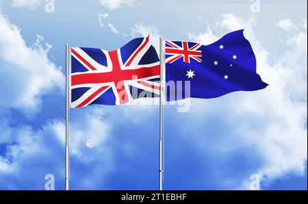 Regno Unito e Australia bandierano insieme sventolando contro il cielo blu Foto Stock