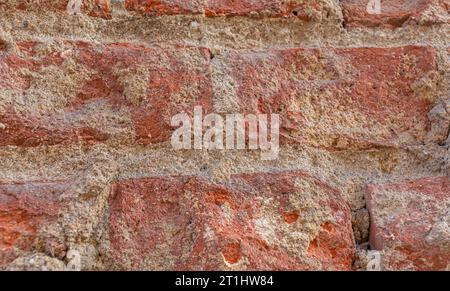 primo piano della vecchia parete in mattoni Foto Stock