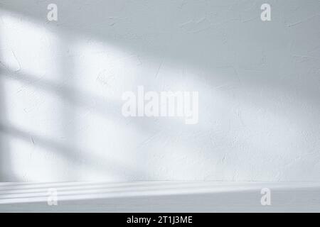 Sfondo grigio blu per la presentazione del prodotto con ombre e luci dalla finestra Foto Stock