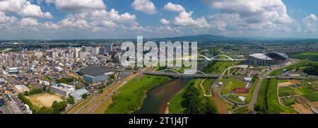 Toyotashi, Aichi, paesaggio urbano giapponese sul fiume Yahagi. Foto Stock