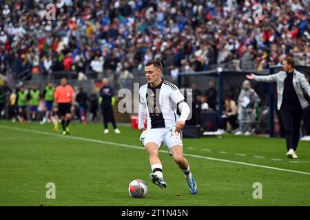 East Hartford, Stati Uniti. 14 ottobre 2023. Calcio: Internazionale, USA - Germania, Pratt & Whitney Stadium presso il Rentschler Field. Il tedesco Florian Wirtz gioca la palla. Credito: Federico Gambarini/dpa/Alamy Live News Foto Stock