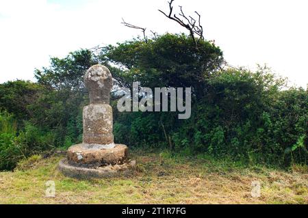 Croce cornica cristianizzata con l'immagine di Cristo scolpita in cima, vicino a San Buryan, Cornovaglia, Regno Unito - John Gollop Foto Stock