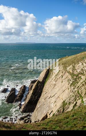 L'enorme lastra di arenaria a Baggy Point sulla costa del Devon settentrionale, un luogo popolare per gli scalatori di roccia Foto Stock