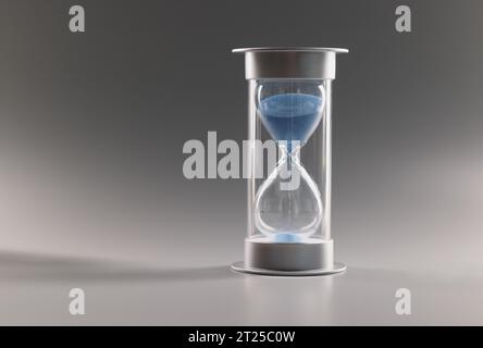 Misurare il tempo di passaggio, il conto alla rovescia, la sabbia blu che scorre attraverso bulbi di clessidra Foto Stock