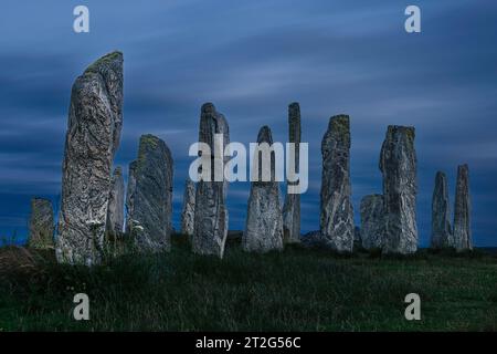 Le pietre di Callanish sono un misterioso e maestoso cerchio di pietre megalitiche sull'isola di Lewis nelle Ebridi esterne della Scozia. Foto Stock