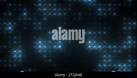 Anello astratto giallo brillante arancione brillante parete di discoteca con lampadine sfondo astratto. Foto Stock