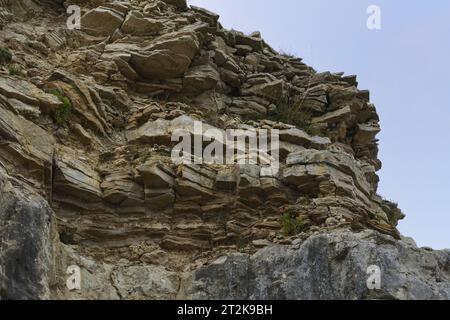 Arenaria rossa dalle scogliere dell'isola di Portland nel Dorset Foto Stock