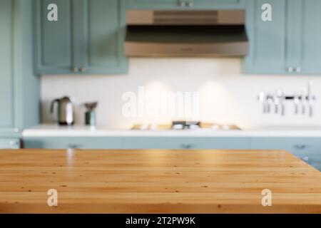 Piano cucina vuoto con sfondo sfocato con elettrodomestici e utensili. Foto Stock