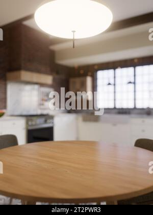 Cucina con un'enfasi sulla superficie del tavolo da cucina con uno sfondo sfocato - un luogo dove posizionare i prodotti. Foto Stock