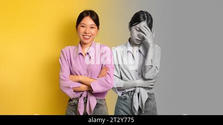 L'umore delle donne asiatiche di mezza età passa da felice a depresso con i telefoni Foto Stock