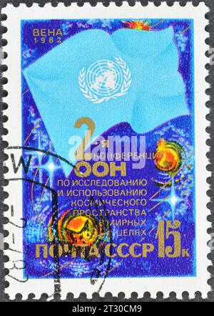 Francobollo cancellato stampato dall'URSS, che promuove la seconda Conferenza delle Nazioni Unite sull'esplorazione dello spazio, intorno al 1982. Foto Stock