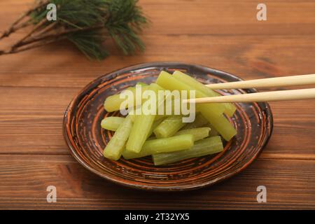 Butterbur giapponese bollito Foto Stock