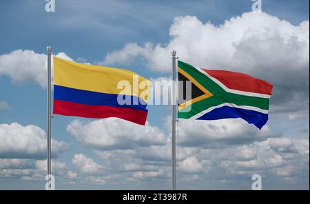 Le bandiere della Repubblica del Sudafrica e della Colombia sventolano insieme nel vento su un cielo nuvoloso blu, concetto di relazione tra due paesi Foto Stock