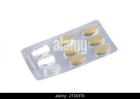 compressa di farmaco sigillata su sfondo bianco Foto Stock