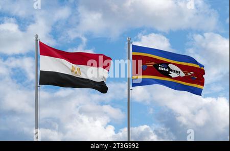 Eswatini ex Swaziland e Egypt bandiere che sventolano insieme nel vento su un cielo nuvoloso blu, concetto di relazione tra due paesi Foto Stock