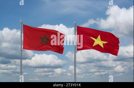 Le bandiere del Vietnam e del Marocco sventolano insieme nel vento su un cielo nuvoloso blu Foto Stock
