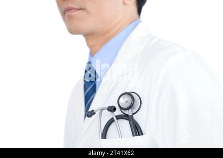 Stetoscopio nella tasca del medico Foto Stock