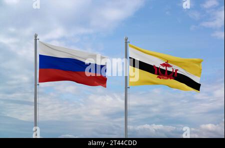 Le bandiere del Brunei e della Russia sventolano insieme su un cielo nuvoloso blu, concetto di due relazioni tra paesi Foto Stock