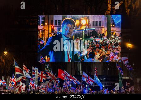 Richard Tice, presidente del partito Brexit, sul grande schermo dell’evento festeggiato in Parliament Square il giorno della Brexit, 31 gennaio 2020, a Londra, Regno Unito Foto Stock