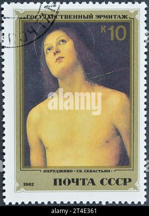 Francobollo annullato stampato dall'Unione Sovietica, che mostra il dipinto di St. Sebastian, Pietro Perugino, dipinti italiani al Museo dell'Ermitage, Leningrado, Foto Stock