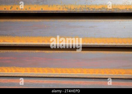 l'acciaio arrotolato si accumula, primo piano della foto Foto Stock