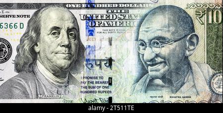 Ritratti di Benjamin Franklin su banconote in dollari americani e Mahatma Gandhi su rupie indiane. Concetto aziendale del tasso di cambio, cambio di azioni Foto Stock
