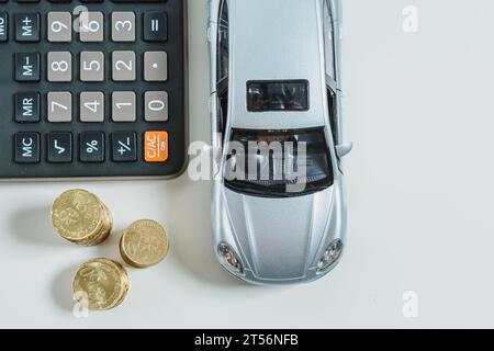 Le spese per l'auto. Foto Stock