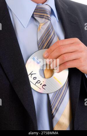 Businessmann mit einer Daten CD in der Hand - Datenklau, BLF *** uomo d'affari con un CD dati in mano furto di dati, BLF 07010537 x credito: Imago/Alamy Live News Foto Stock