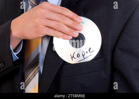 Businessmann mit einer Daten CD in der Hand - Datenklau, BLF *** uomo d'affari con un CD dati in mano furto di dati, BLF 07010527 x credito: Imago/Alamy Live News Foto Stock