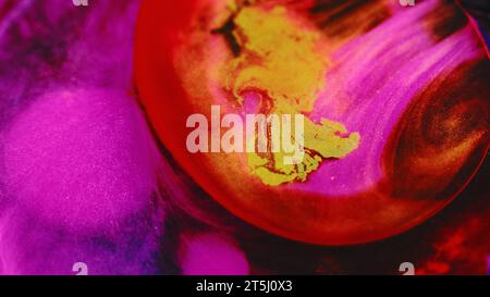 Sfera di inchiostro rosa rosso nebbia di colore glitter Foto Stock