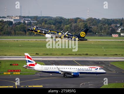 Aeroporto di Düsseldorf, Eurowings Aircraft, Airbus A320-200, FAN bus, BVB FanAirbus, aerei Eurowings, Airbus, sulla pista, pista di rullaggio, posizione di parcheggio Foto Stock