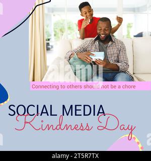 Composito di testo del giorno della gentilezza dei social media e ragazzo afro-americano che fa dono al padre a casa Foto Stock