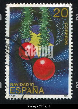 SPAGNA - CIRCA 1987: Francobollo stampato dalla Spagna, mostra le decorazioni dell'albero di Natale, circa 1987 Foto Stock