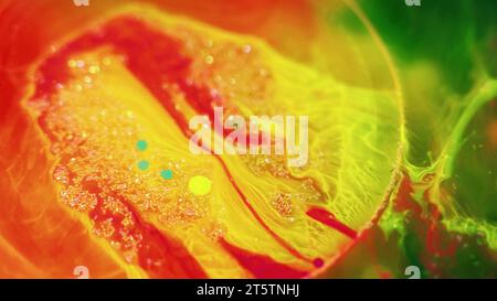 Vernice acqua glitter olio bolla giallo goccia di fluido Foto Stock