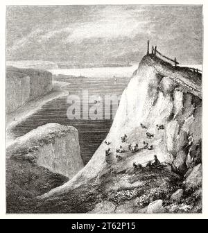 Vecchia vista del bastione naturale vicino al porto di Dieppe e del faro di Lhay sullo sfondo, Francia. Di Champin, publ. Su Magasin Pittoresque, Parigi, 1849 Foto Stock