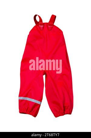 Abbigliamento per bambini - impermeabile rosso con catarifrangente sulla gamba isolato sullo sfondo bianco Foto Stock