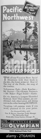 La pubblicità stradale di Milwaukee - Route of the Olympian, Pacific Northwest in una rivista Natgeo 1934 Foto Stock