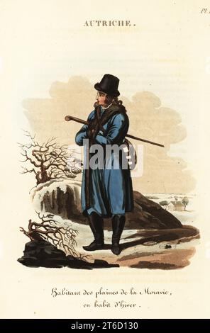 Uomo moravo in veste invernale, Repubblica Ceca, XVIII secolo. Indossa un cappello in stile inglese, un mantello blu foderato in pelliccia e mezzo stivali ungheresi. Uomo di pianura della Moravia in abito invernale, Habitant des plaines de la Moravie en habit d'hiver. Incisione su copperplate a mano dopo un'illustrazione di William Alexander di J-B.. Eyries l'Autriche: Costumes, Moeurs et Usages des Autrichiens, Austria: Costumes, Manners and Mores of the Austrians, Librairie de Gide Fils, Parigi, 1823. Jean-Baptiste Eyries (1767-1846) è stato un geografo, autore e traduttore francese. Foto Stock