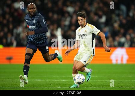 Madrid, Spagna. 8 novembre 2023. Brahim Diaz del Real Madrid e al-Musrati del SC Braga durante la partita di UEFA Champions League, gruppo C, tra Real Madrid e Sporting Clube de Braga hanno giocato allo stadio Santiago Bernabeu l'8 novembre 2023 a Madrid, in Spagna. (Foto di Bagu Blanco/PRESSINPHOTO) crediti: PRESSINPHOTO SPORTS AGENCY/Alamy Live News Foto Stock