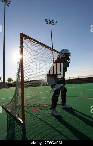 Lacrosse goalie durante il gioco di campionato Foto Stock