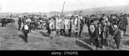 "La Roumanie Envahie; Paysans de la Dobroudja emigrant vers le Nord", 1916. Da "l'album de la Guerre 1914-1919, volume 1" [l'Illustration, Paris, 1924]. Foto Stock