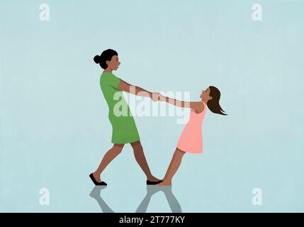 Madre e figlia felici che si tengono per mano e si piegano Foto Stock