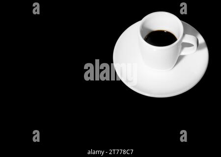 tazza di caffè con spazio per il testo su sfondo nero Foto Stock