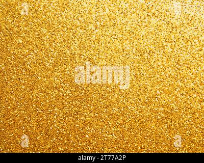 Sfondo dorato scintillante che utilizza come sfondo di lusso natalizio con spazio per testo o immagine Foto Stock