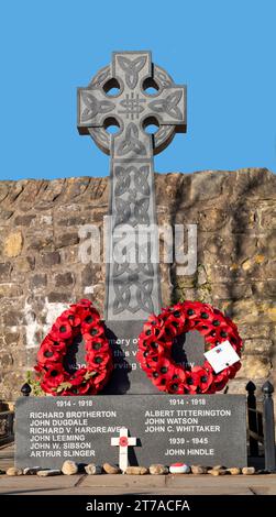 Il monumento commemorativo di guerra del villaggio a West Bradford, che commemora gli uomini locali che persero la vita in conflitto, Ribble Valley, Lancashire, Regno Unito. Foto Stock