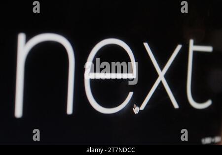 Una foto del logo della società successiva sullo schermo di un computer. Foto Stock