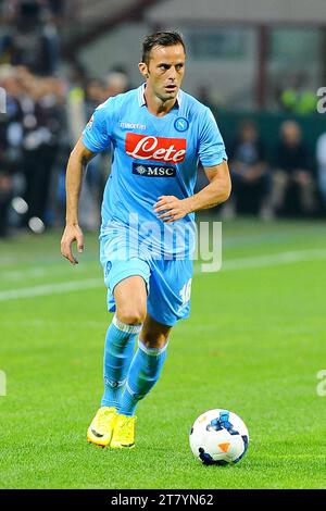 Giandomenico Mesto dell'SSC Napoli in azione durante la partita di calcio del Campionato Italiano di serie A 2013-2014 tra AC Milan e SSC Napoli il 22 settembre 2013 a Milano. Foto massimo Cebrelli / DPPI Foto Stock