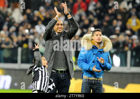 David Trezeguet ex giocatore della Juventus fa il tifoso con i figli prima del campionato italiano di serie A 2013/2014 tra FC Juventus e AS Roma allo Juventus Stadium il 5 gennaio 2014 a Torino. Foto massimo Cebrelli / DPPI Foto Stock