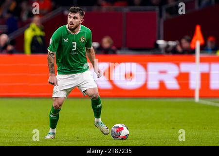 Amsterdam, Paesi Bassi. 18 novembre 2023. AMSTERDAM, PAESI BASSI - 18 NOVEMBRE: L'irlandese Ryan Manning corre con la palla durante la partita del gruppo B del turno di qualificazione UEFA EURO 2024 tra Paesi Bassi e Repubblica d'Irlanda alla Johan Cruijff Arena il 18 novembre 2023 ad Amsterdam, Paesi Bassi (foto di Andre Weening/Orange Pictures) credito: Orange Pics BV/Alamy Live News Foto Stock