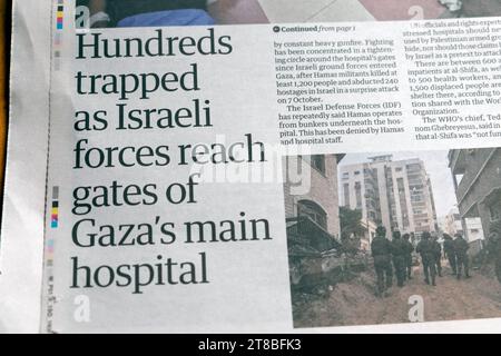 "Centinaia di persone intrappolate mentre le forze israeliane raggiungono le porte dell'ospedale principale di Gaza", titolo del giornale The Shifa Guardian Israel Hamas War articolo 14 Nov 2023 UK Foto Stock
